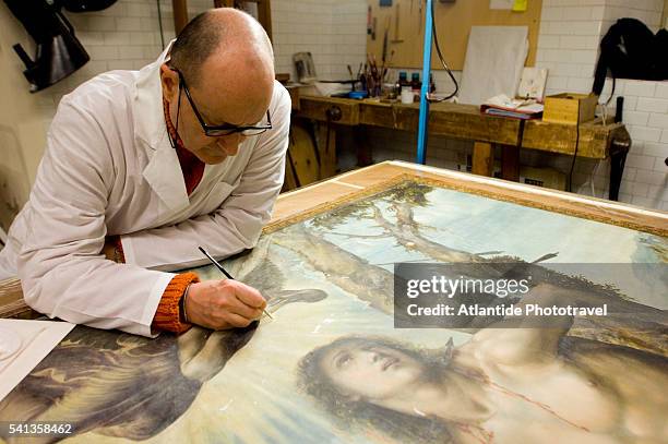 art conservator mario ceresa restoring painting - restore stock pictures, royalty-free photos & images