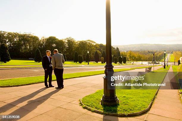 northern ireland assembly officials in belfast - northern ireland assembly buildings stock pictures, royalty-free photos & images