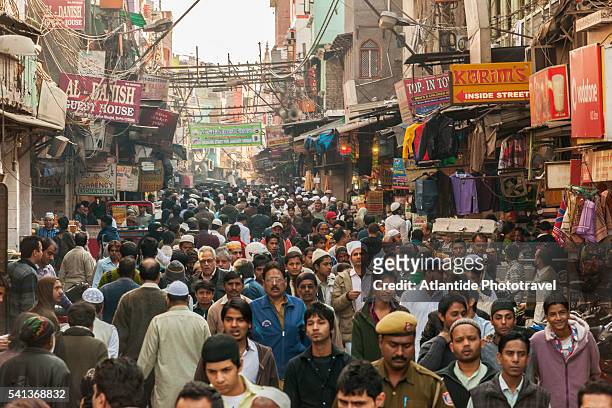 crowded street around jama masjid - delhi street stock pictures, royalty-free photos & images
