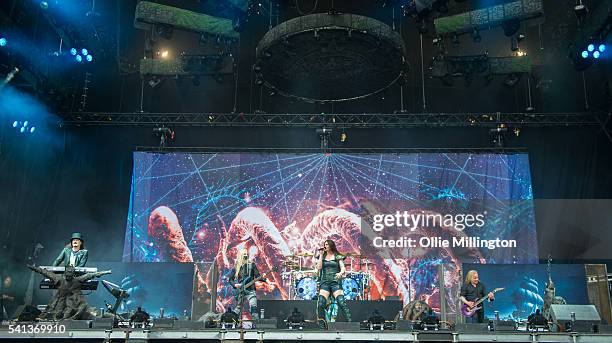 Tuomas Holopainen,ÊMarco Hietala,ÊEmppu Vuorinen, Jukka Nevalainen and Floor Jansen of Nightwish performs onstage during day 2 of Download Festival...