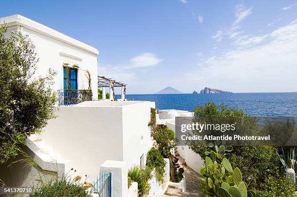 traditional whitewashed house by the sea - aeolian islands stockfoto's en -beelden