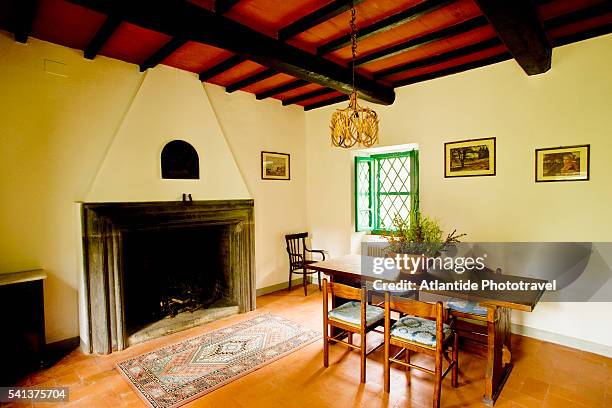 dining room with a fireplace in a private house - anghiari bildbanksfoton och bilder