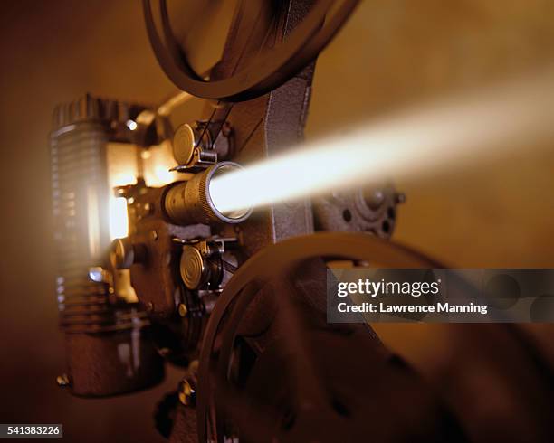 close-up view of an old movie projector - cinema projector stock pictures, royalty-free photos & images