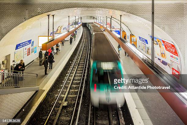 the metro (underground) station palais-royal musée© du louvre - paris metro stock pictures, royalty-free photos & images