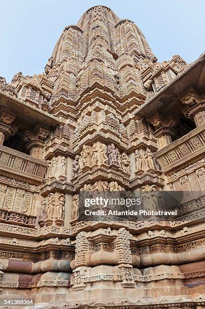 erotic figures carved in sandstone at the lakshmana temple - lakshmana temple stock pictures, royalty-free photos & images