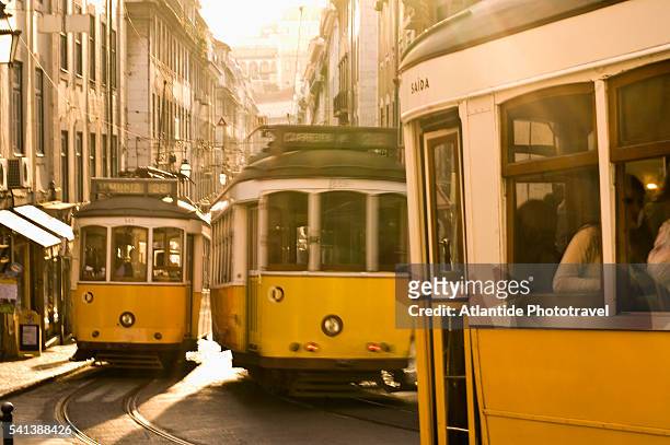 trolley cars on rua da conceicao in lisbon - conceicao stock pictures, royalty-free photos & images