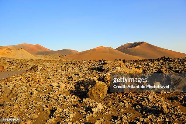 timanfaya volcano park - cinder cone volcano stock pictures, royalty-free photos & images