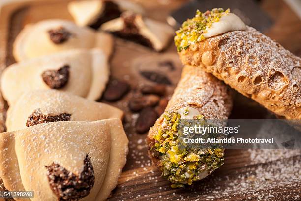 bonajuto, the oldest chocolate factory in sicily, typical sicilian cannoli and other sweets - modica sicily stock pictures, royalty-free photos & images