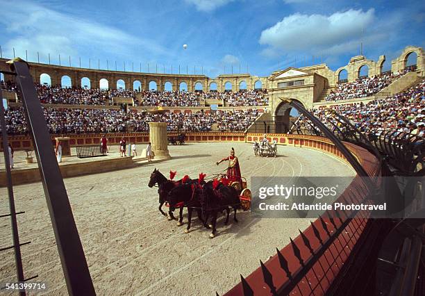 chariot race at puy du fou historical theme park - fou stock pictures, royalty-free photos & images