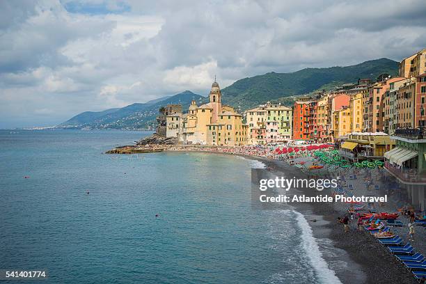 the beach and santa maria assunta basilique - camogli stock pictures, royalty-free photos & images