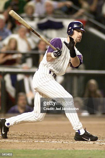 Luis Gonzalez swings at a pitch during game 7 of the World Series against the New York Yankees at Bank One Ballpark in Phoenix, Arizona. The...