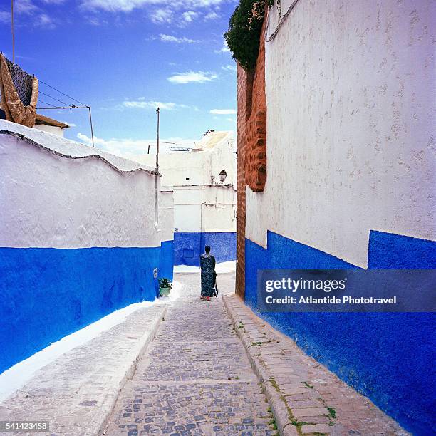 alley and blue buildings in kasbah des oudaias - rabat morocco stock pictures, royalty-free photos & images