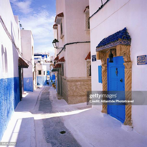 alley and blue buildings in kasbah des oudaias - rabat morocco stock pictures, royalty-free photos & images