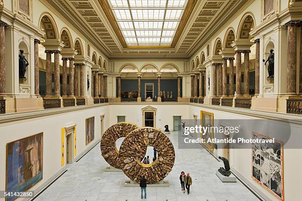 royal museums of fine arts, the forum with sculptures by javier marin - adult man brussels stock pictures, royalty-free photos & images