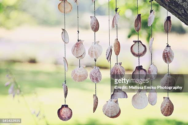summer breeze - wind chime stock pictures, royalty-free photos & images