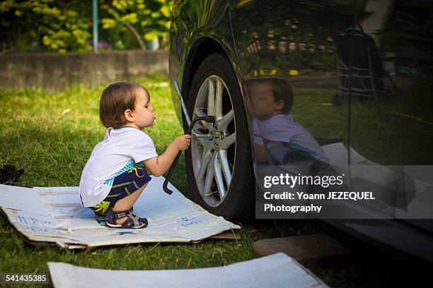 Engine Rool Near Baby 213 Infant Mechanic In Stock Photos, High-Res Pictures, and Images ...