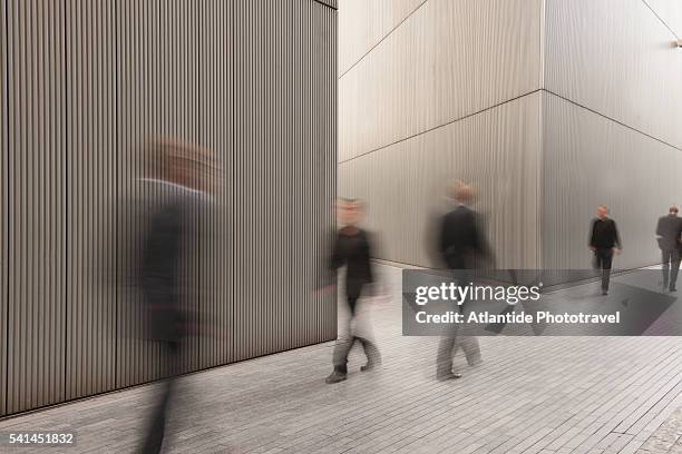 more london center, near city hall - blurred motion person stock-fotos und bilder