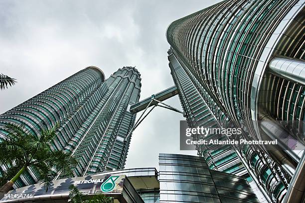 view of petronas towers - skybridge petronas twin towers stock pictures, royalty-free photos & images