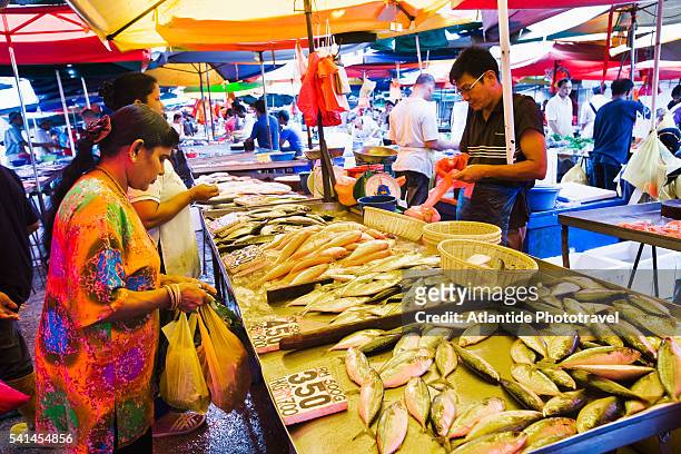 pudu market fishmonger - pudu stock pictures, royalty-free photos & images