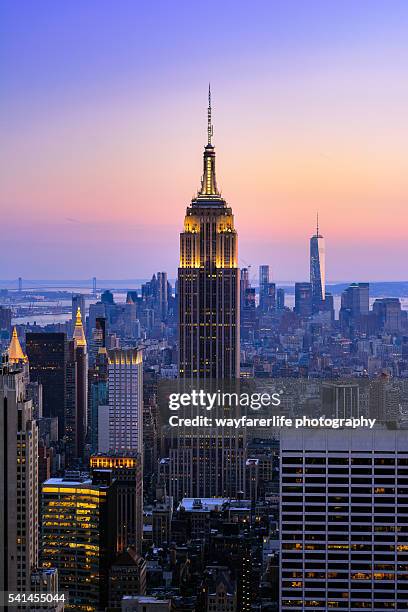 empire state building and city skyscraper, new york, usa - empire state building stock-fotos und bilder