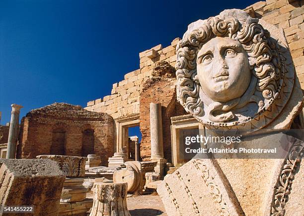 medusa head at leptis magna archaeological site - ruins of leptis magna stock pictures, royalty-free photos & images