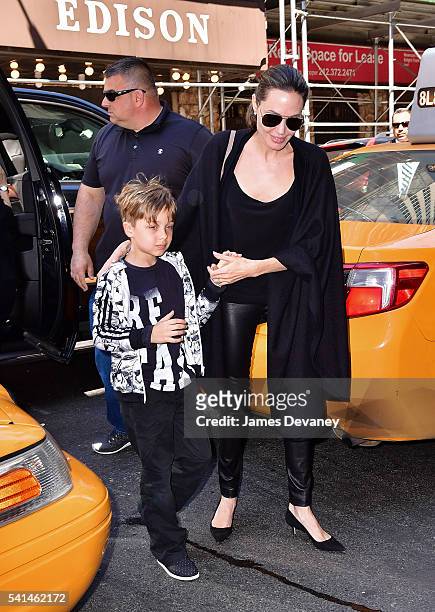 Knox Jolie-Pitt and Angelina Jolie arrive to Broadway musical Hamilton at Richard Rodgers Theatre on June 19, 2016 in New York City.