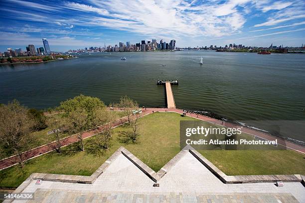 manhattan seen from the statue of liberty - liberty island stock pictures, royalty-free photos & images