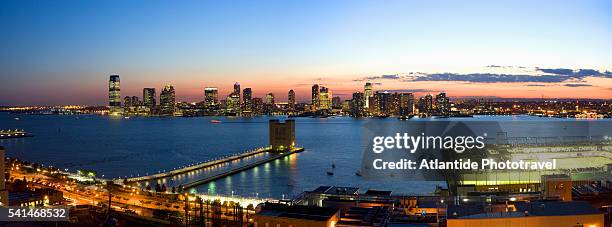 view of jersey city from building on hudson street - jersey city stock-fotos und bilder