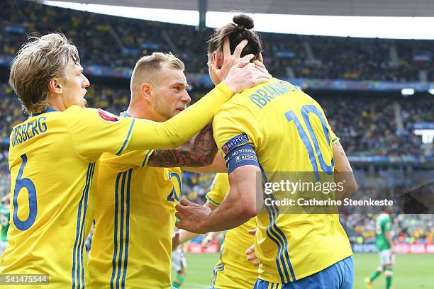 Emil Forsberg, Zlatan Ibrahimovic and John Guidetti of Sweden celebrate after Republic of Ireland scored an own goal to make 1-1 during the UEFA EURO...