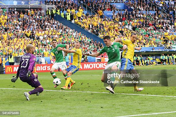 Zlatan Ibrahimovic of Sweden tries to shoot the ball against Ciaran Clark and Darren Randolph of Republic of Ireland during the UEFA EURO 2016 Group...