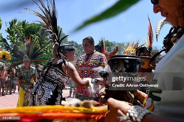 David Ocelotl is presented with incense during a mural dedication at La Raza Park on Sunday, June 20, 2016. The Denver Arts and Venue' public art...