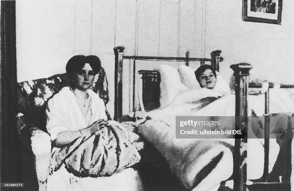 Russia Tsarina Alexandra Feodorowna (*25.04.1872-16.07.1918+) The Tsarina at the bedside of Tsarevich Alexei - around 1910