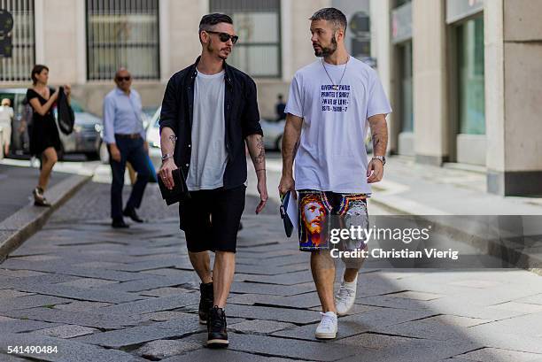 Guests wearing shorts outside Ferragamo during the Milan Men's Fashion Week Spring/Summer 2017 on June 19, 2016 in Milan, Italy.