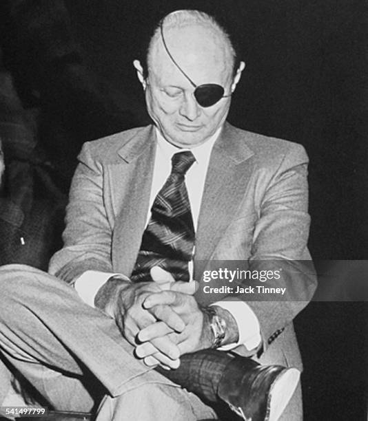 Israeli Foreign Minister Moshe Dayan sits cross-legged during a visit to the Young Men's Hebrew Association, Philadelphia, Pennsylvania, 1978.