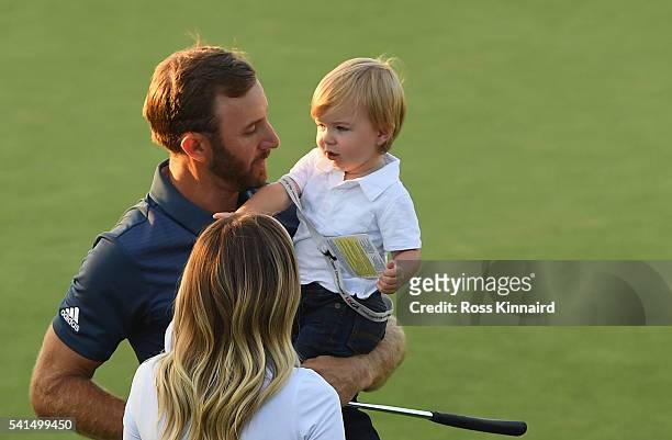 Dustin Johnson of the United States celebrates with partner Paulina Gretzky and son Tatum after winning the final round of the U.S. Open at Oakmont...
