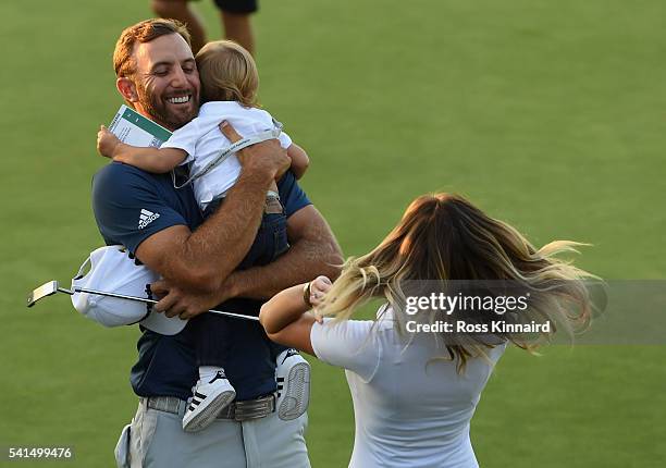 Dustin Johnson of the United States celebrates with partner Paulina Gretzky and son Tatum after winning the final round of the U.S. Open at Oakmont...