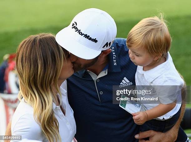 Dustin Johnson of the United States celebrates with partner Paulina Gretzky and son Tatum after winning the final round of the U.S. Open at Oakmont...