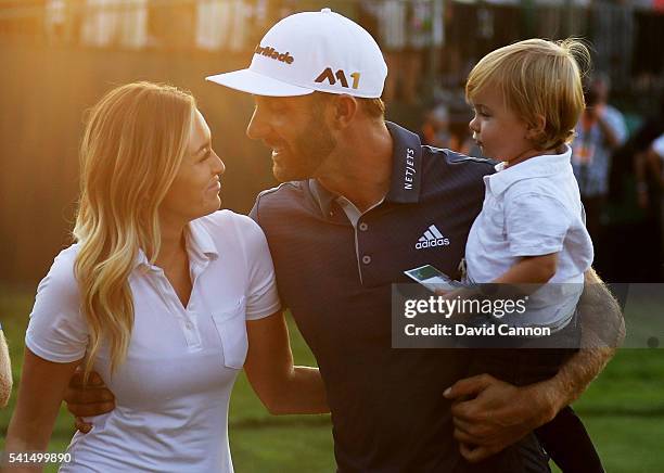 Dustin Johnson of the United States celebrates with partner Paulina Gretzky and son Tatum after winning the U.S. Open at Oakmont Country Club on June...