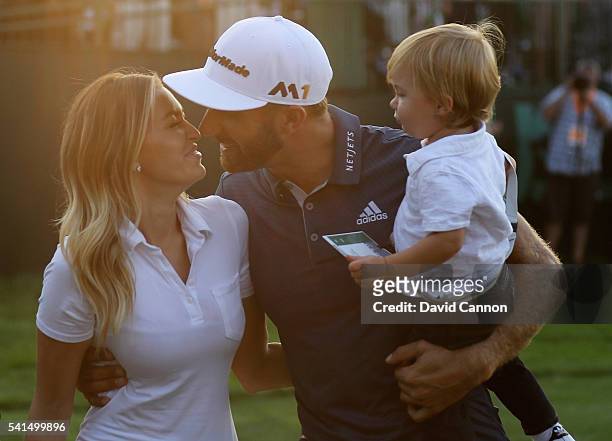 Dustin Johnson of the United States celebrates with partner Paulina Gretzky and son Tatum after winning the U.S. Open at Oakmont Country Club on June...
