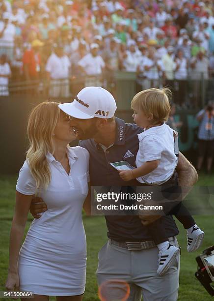 Dustin Johnson of the United States celebrates with partner Paulina Gretzky and son Tatum after winning the final round of the U.S. Open at Oakmont...