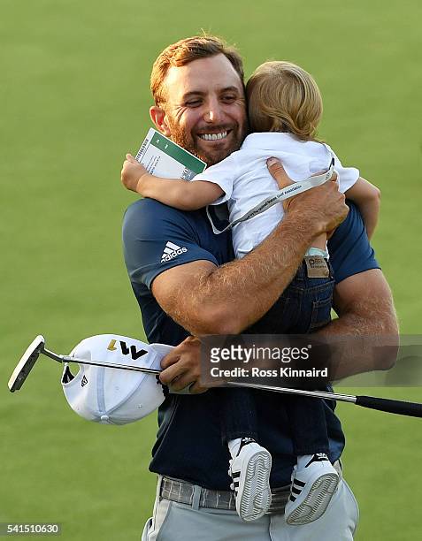 Dustin Johnson of the United States celebrates with son Tatum after winning the U.S. Open at Oakmont Country Club on June 19, 2016 in Oakmont,...