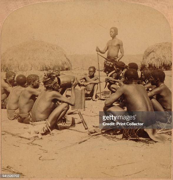 Braves of a Zulu Village holding a Council, near the Umlaloose River, Zululand, S.A.', 1901. [Underwood & Underwood, New York, London,...