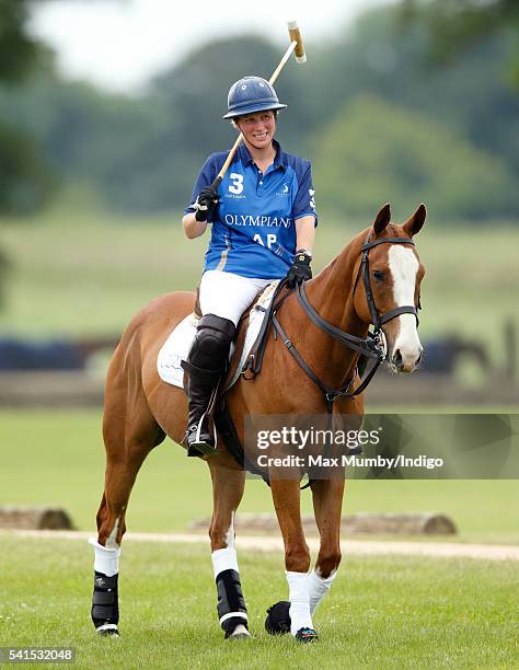 Zara Phillips plays in a Jockeys vs Olympians charity polo match at the Beaufort Polo Club on June 19, 2016 in Tetbury, England.