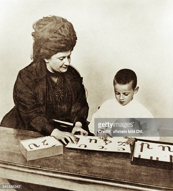 Italian physician and educatorMontessori teaching a boy from an orphanage in Rome