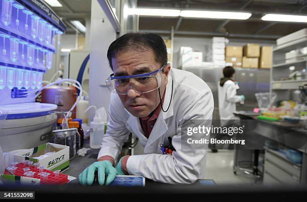 An employee uses a laptop computer at the PeptiDream Inc. Laboratory inside the The University of Tokyo in Tokyo, Japan, on Thursday, April 14, 2016....