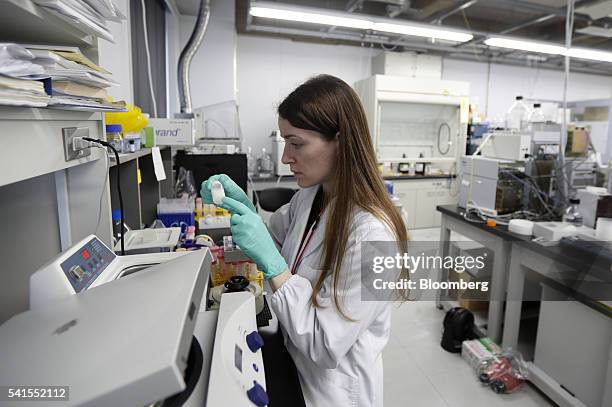 An employee works at the PeptiDream Inc. Laboratory inside the The University of Tokyo in Tokyo, Japan, on Thursday, April 14, 2016. PeptiDream is...