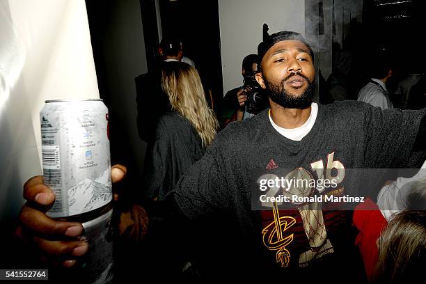 Mo Williams of the Cleveland Cavaliers celebrates in the locker room after defeating the Golden State Warriors 93-89 in Game 7 to win the 2016 NBA...
