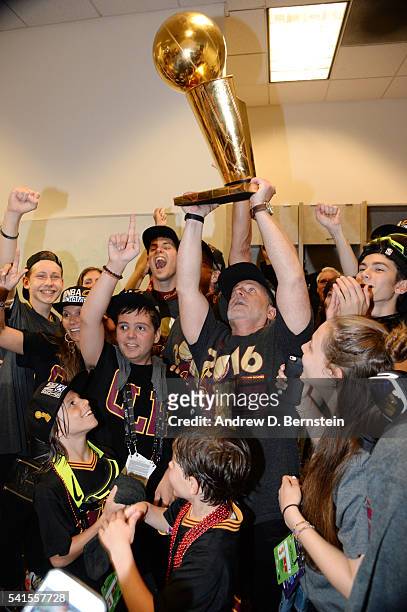 Cleveland Cavaliers owner Dan Gilbert celebrates with the Larry O'Brien NBA Championship Trophy after winning Game Seven of the 2016 NBA Finals...
