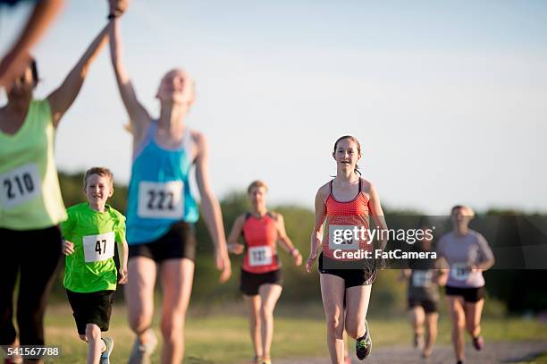Cheering For Running Racers 85 Family Cheering On Runners Stock Photos, High-Res Pictures, and ...
