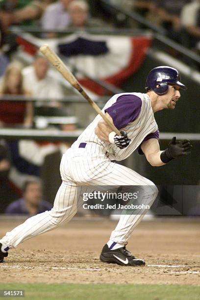 Luis Gonzalez swings ata pitch during game 7 of the World Series against the New York Yankees at Bank One Ballpark in Phoenix, Arizona. The...